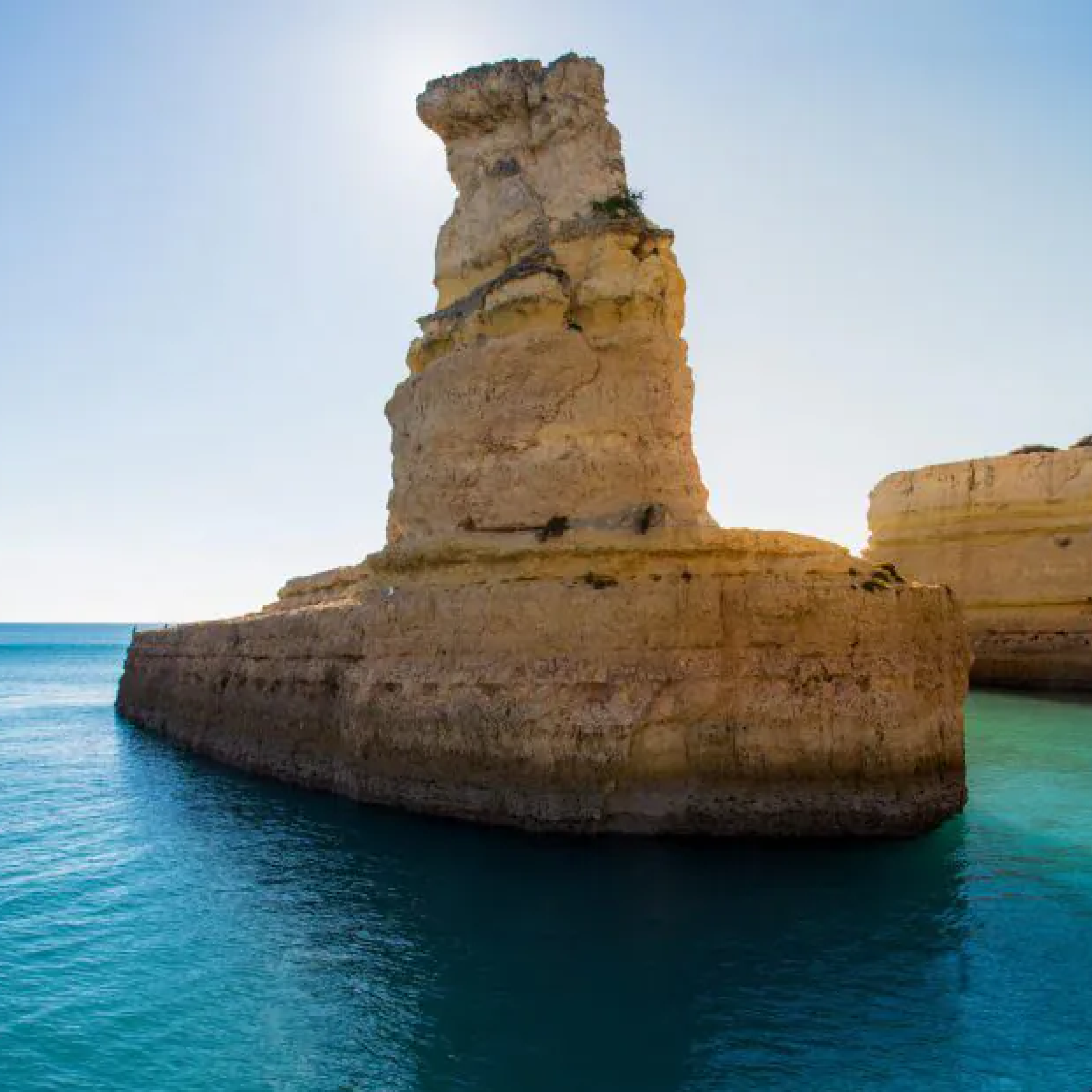 Dramatic limestone rock formation along the Algarve coastline near Benagil Cave Portugal